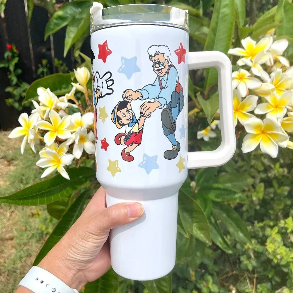 Disney Pinocchio 40 oz Tumbler/Water bottle/Mug with hand carry handle. Large c